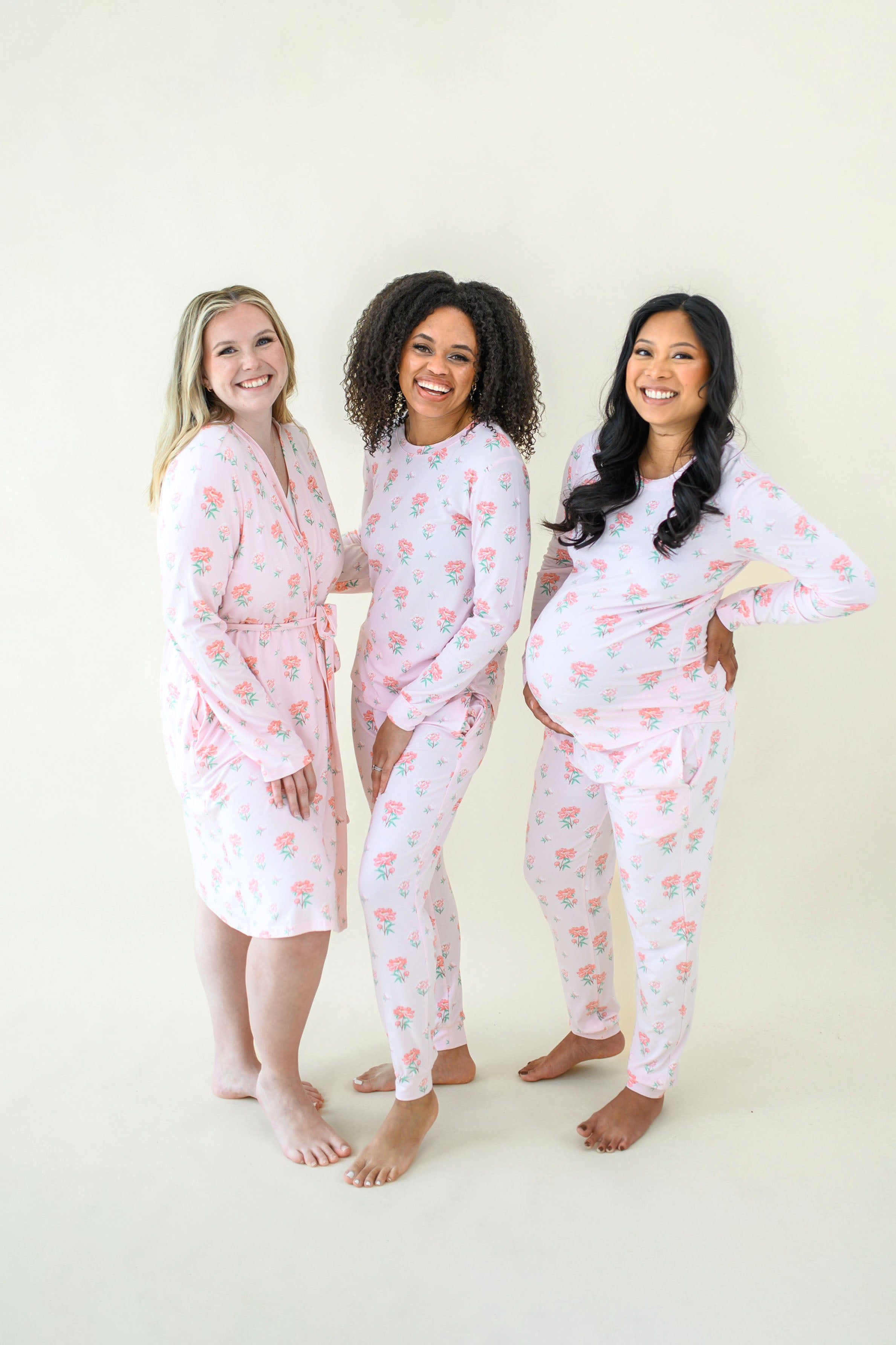 Group of 3 models wearing Sakura Peony items like Lounge Robe and Women's Jogger Set