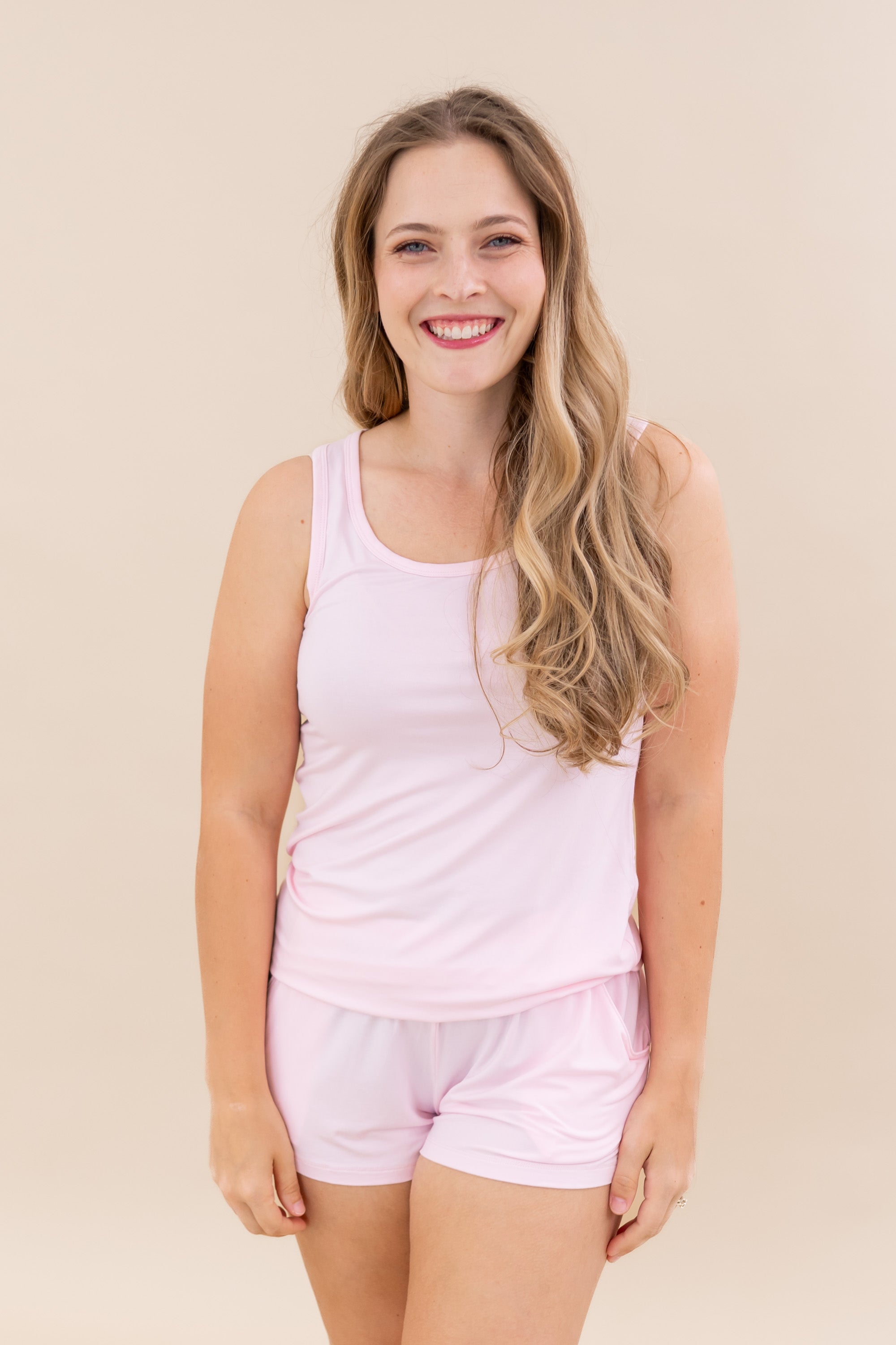 Female wearing the Women’s Tank Set in Sakura