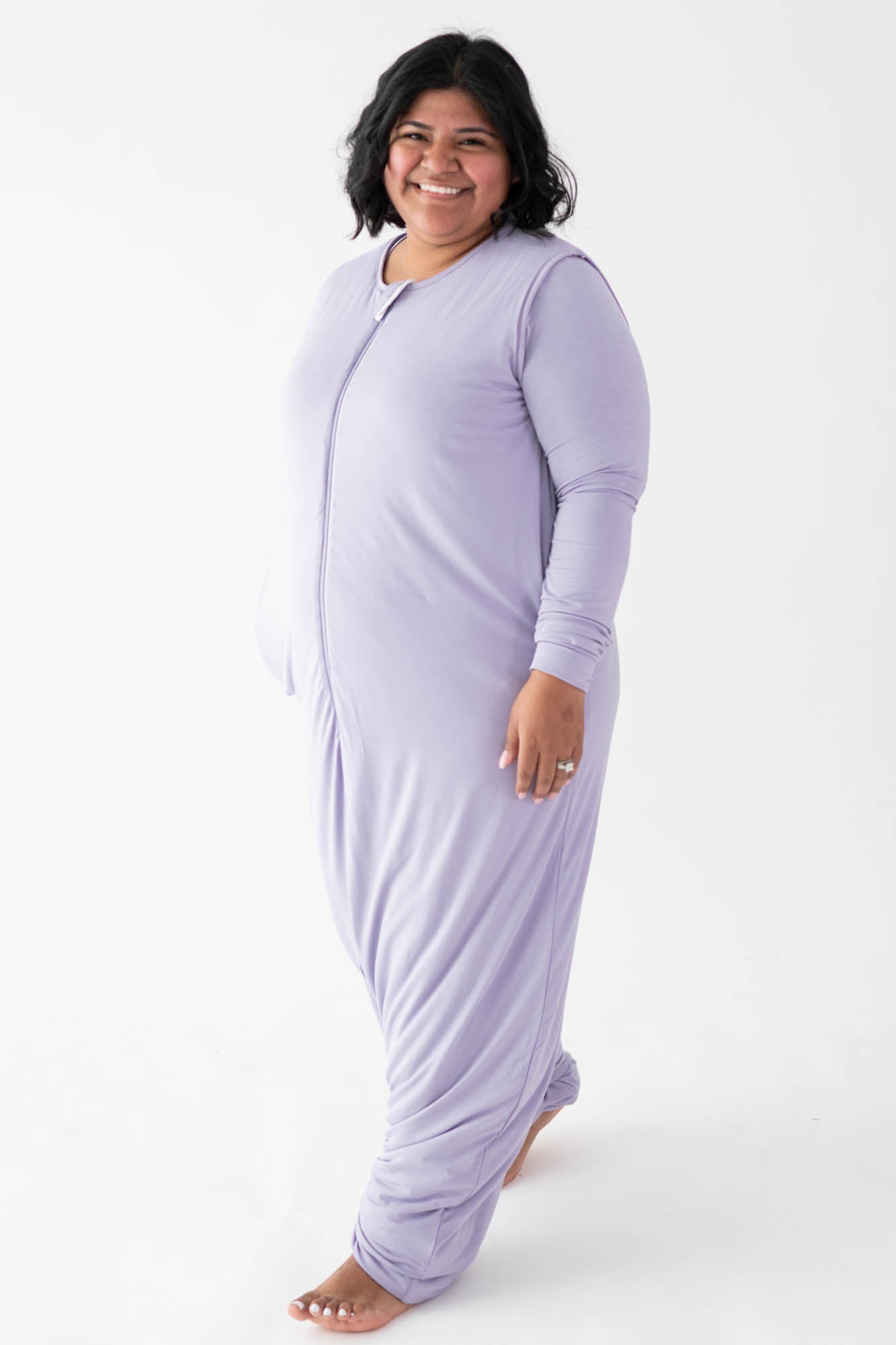 Female model wearing the Adult Sleep Bag Walker in Taro