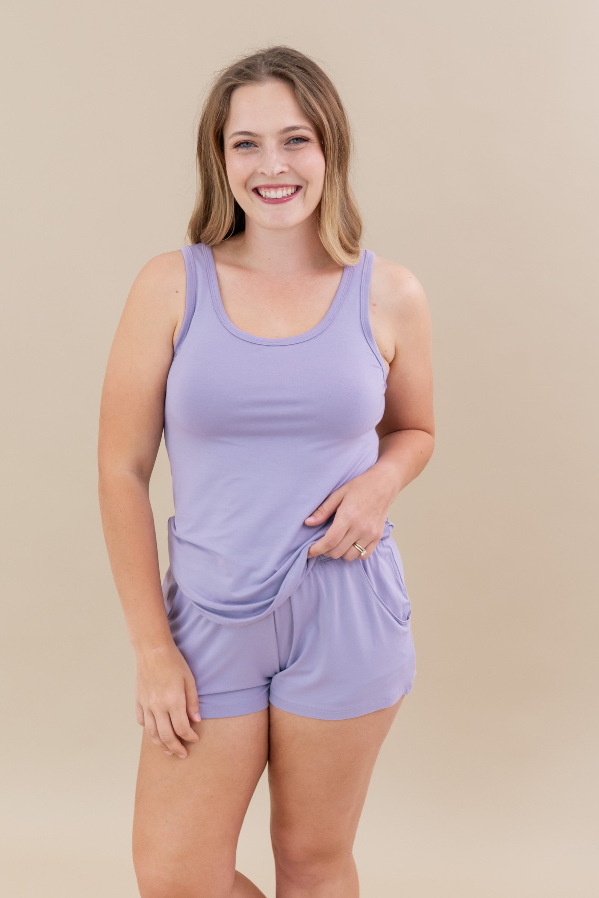 Female modeling the Women’s Tank Set in Taro