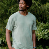 Male model wearing the Men's Crew Neck Tee in Thyme