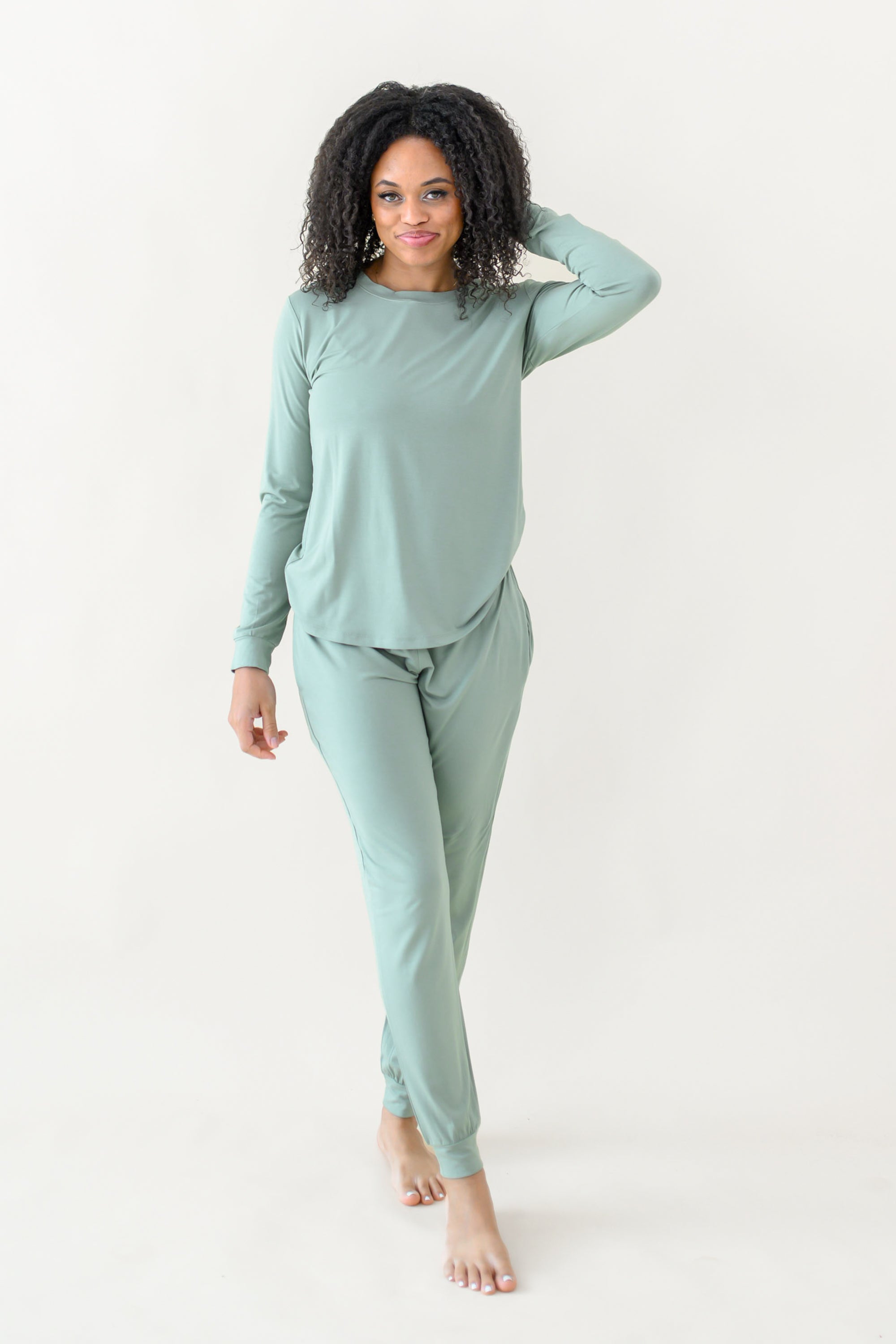 Woman modeling Women's Jogger Pajama Set in Thyme