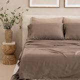 Bamboo Sateen Sheet Set in Truffle shown on a bed