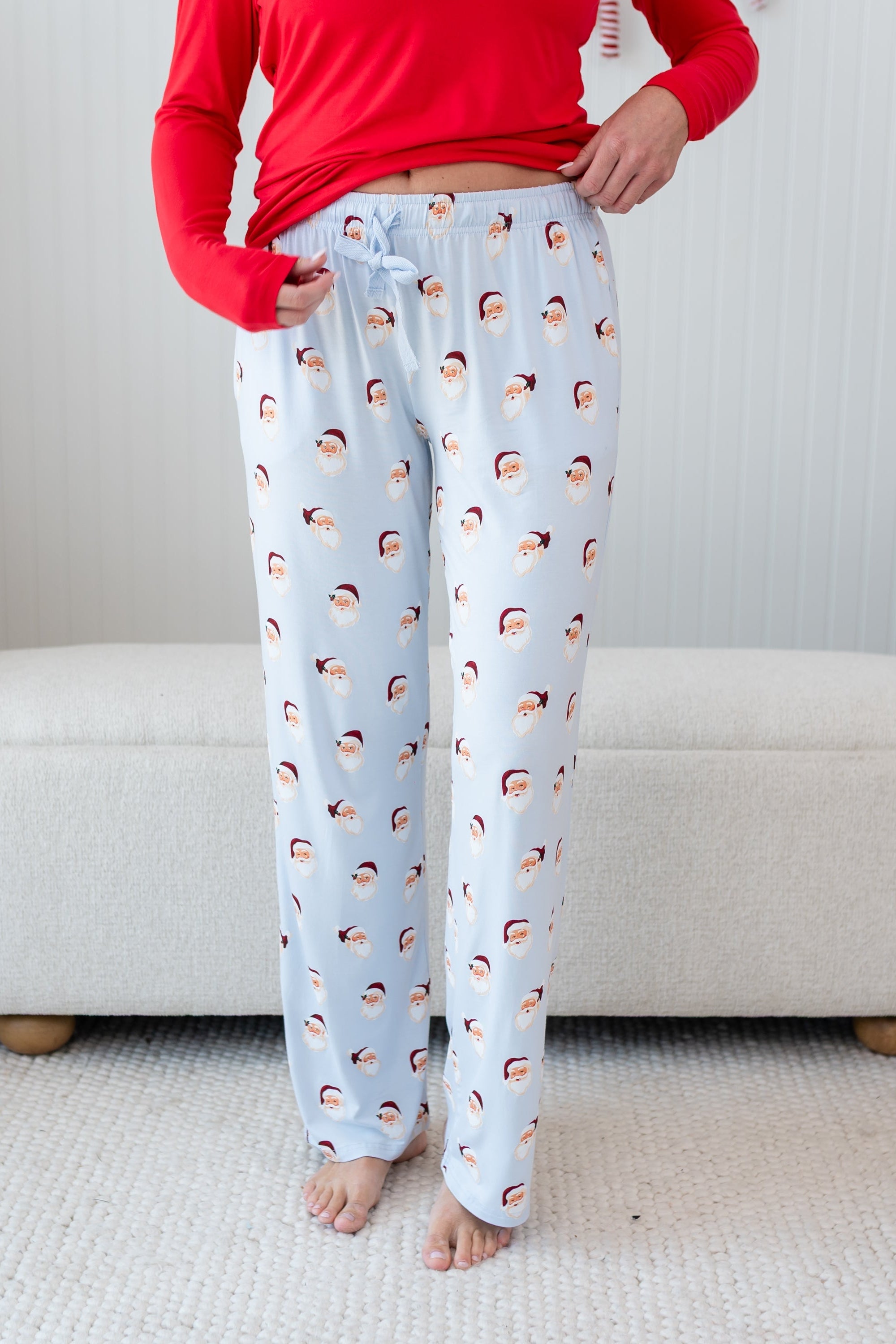 Women's Lounge Pants in Vintage Santa shown on a female model