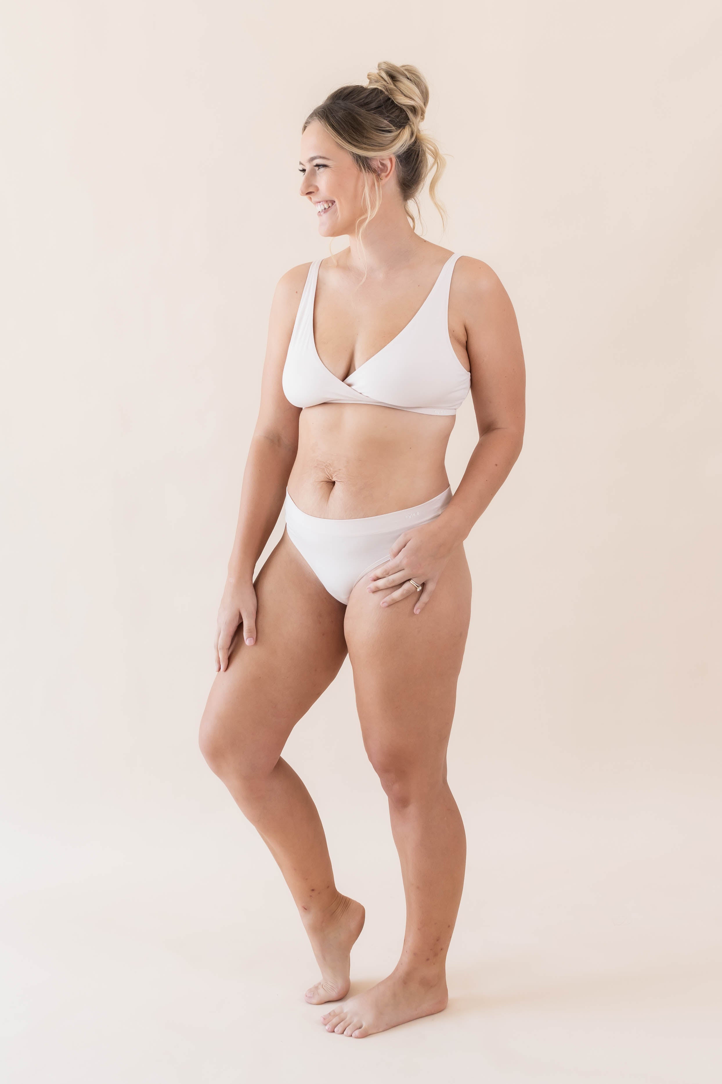 Model wearing the Women's Cross Front Bralette in Blonde