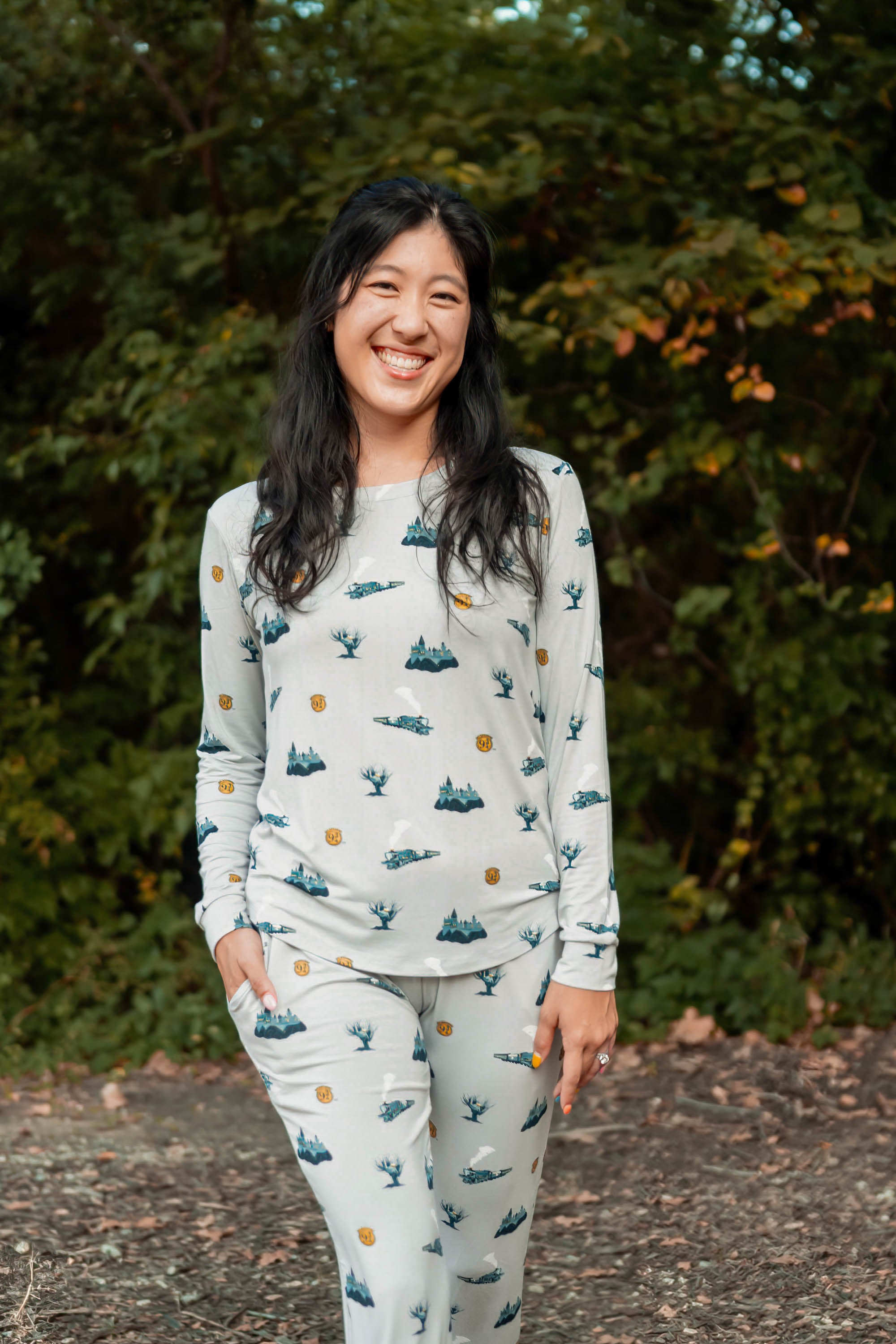 Smiling model wearing Kyte Baby's Women's Jogger Pajama Set in Journey