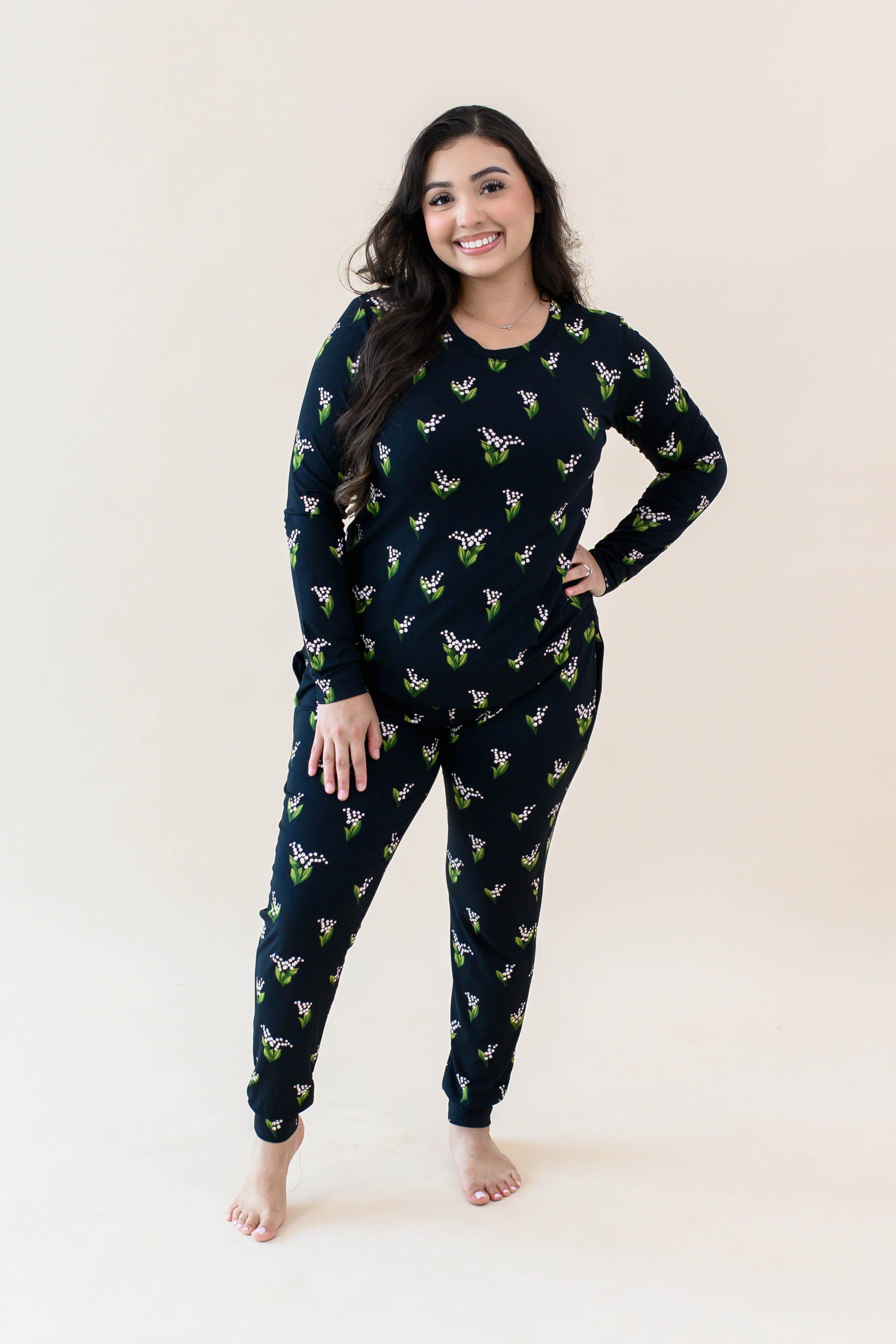 Smiling model wearing the Women's Jogger Pajama Set in Midnight Lily