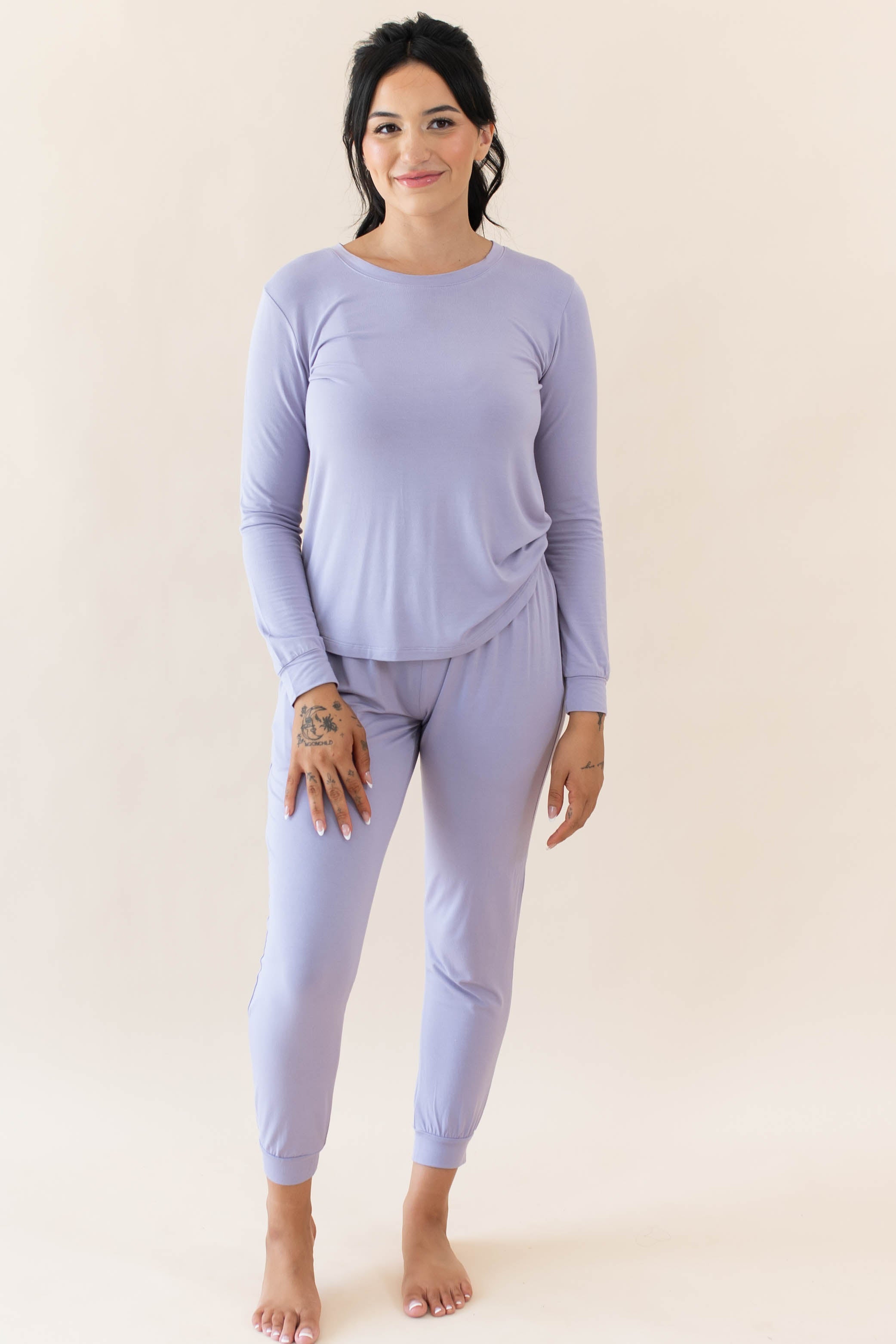 Model wearing Kyte Baby's Women's Jogger Pajama Set in Taro