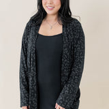 Female model wearing the Women's Lounge Robe in Midnight Leopard overtop the Women's Ribbed Cami Dress in Midnight