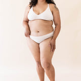 Model wearing Kyte Baby's Women's Nursing Bra in Blonde