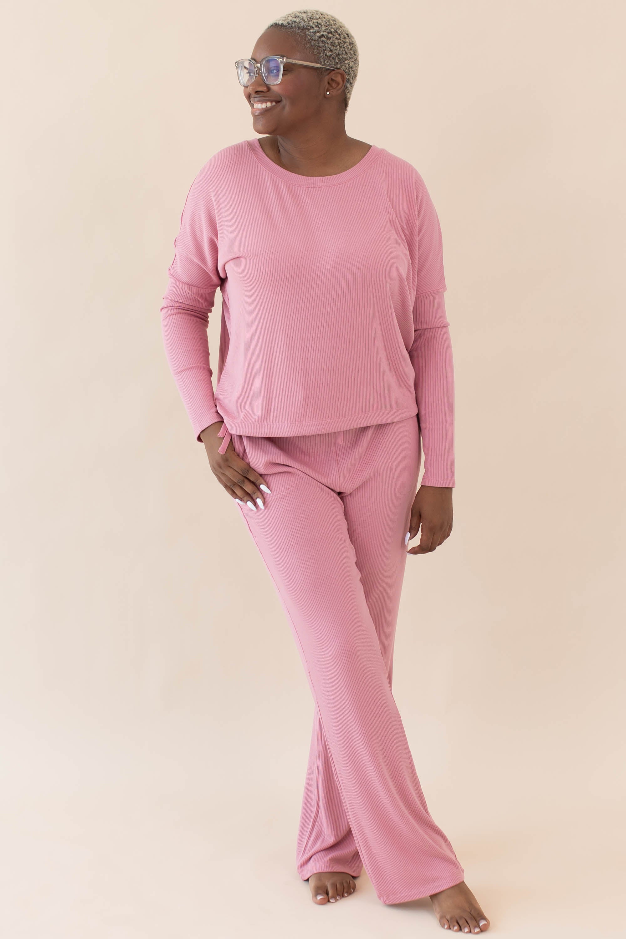 Smiling model wearing the Women's Ribbed High Waisted Wide Leg Pant in Apple Blossom