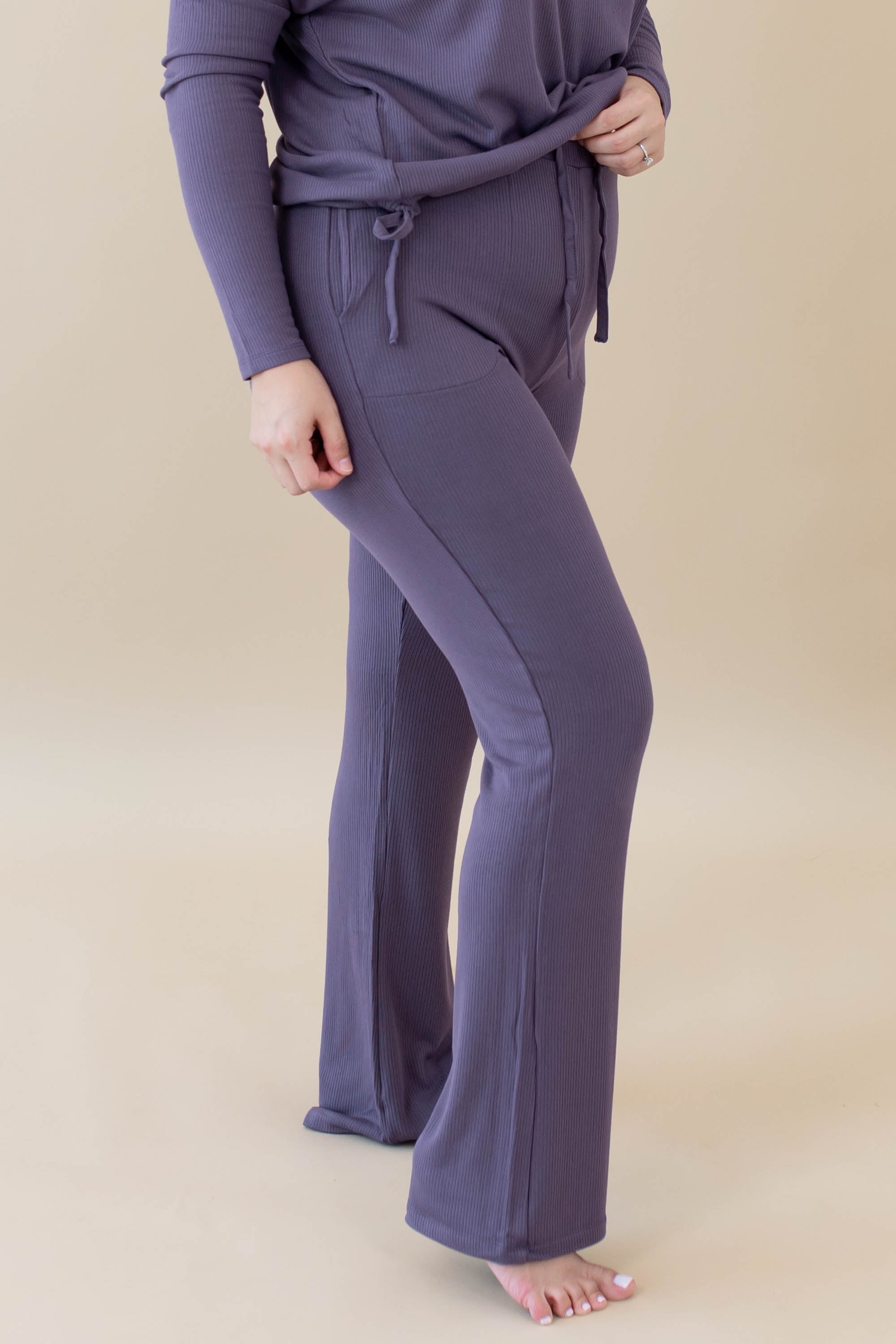 Female model wearing the Women's Ribbed High Waisted Wide Leg Pant in Currant
