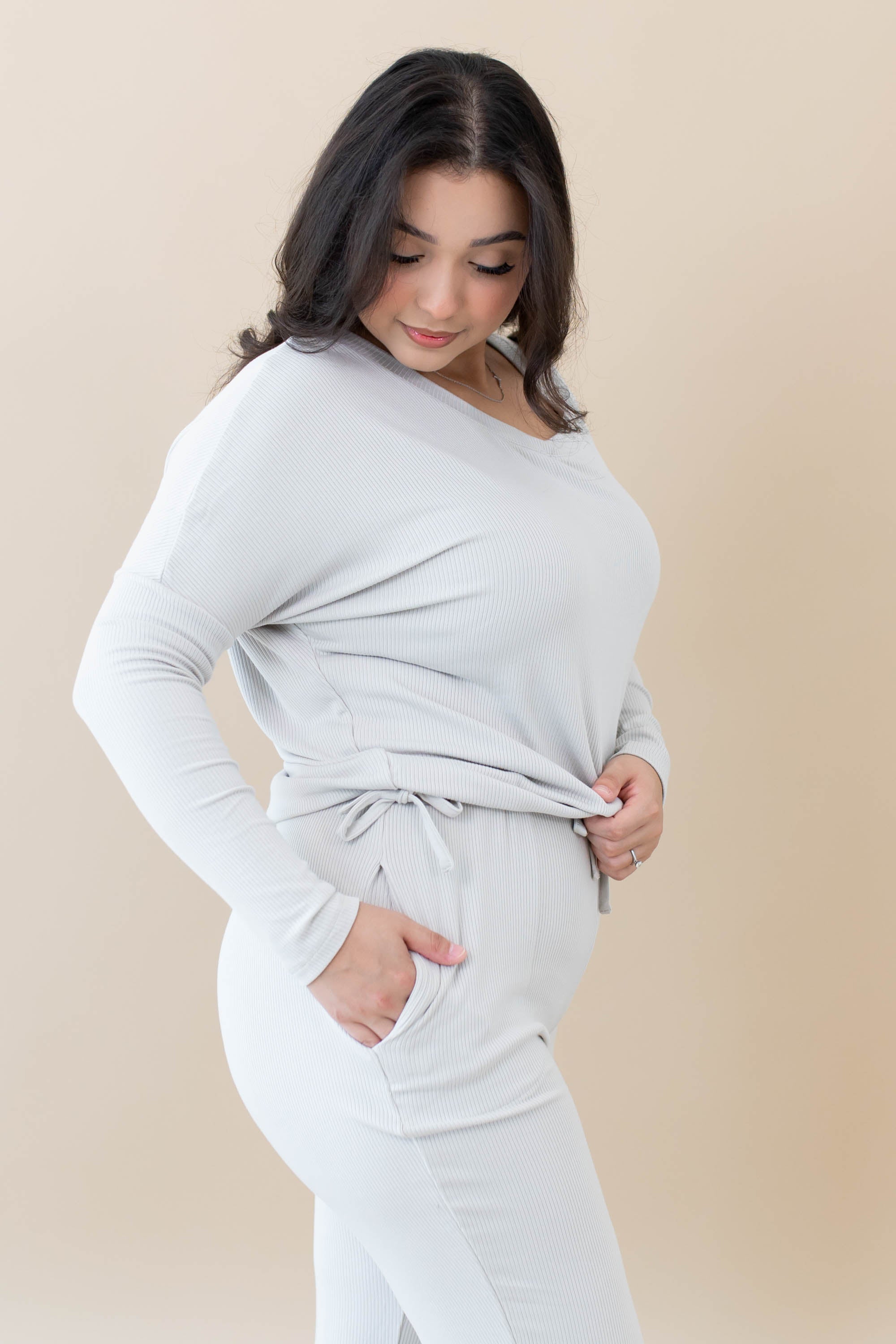 Model in the Women's Ribbed High Waisted Wide Leg Pant in Oat with one hand in pants pocket