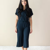 Model wearing the Women's Ribbed Jumpsuit in Midnight