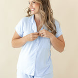 Model wearing size medium modeling Women's Short Sleeve Pajama Set in Mist showing buttons of pajama