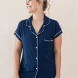 Female modeling Women's Short Sleeve Pajama Set in Navy with Cloud Trim