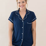 Female modeling Women's Short Sleeve Pajama Set in Navy with Cloud Trim