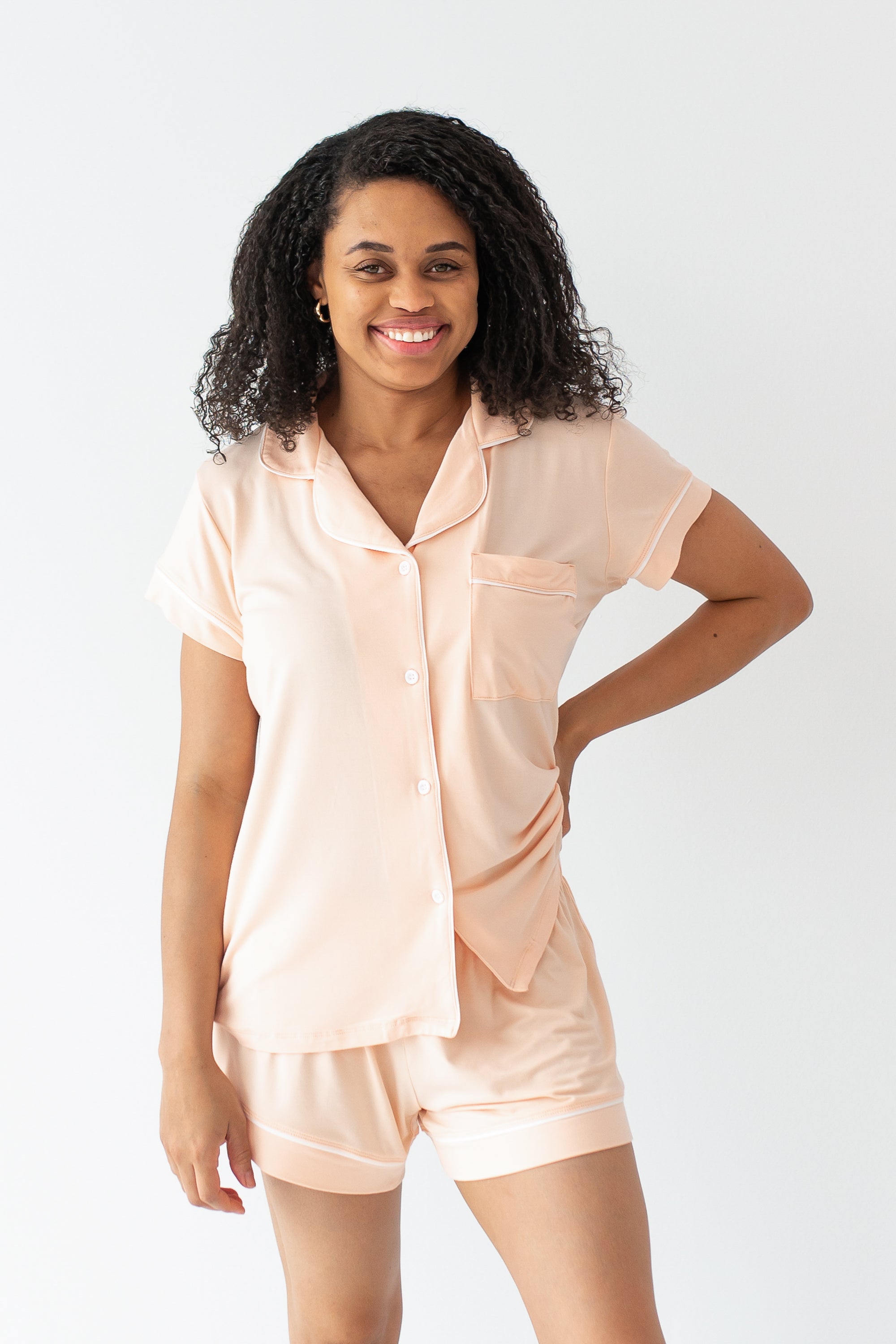 Woman modeling Women's Short Sleeve Pajama Set in Canyon smiling with hand on hip