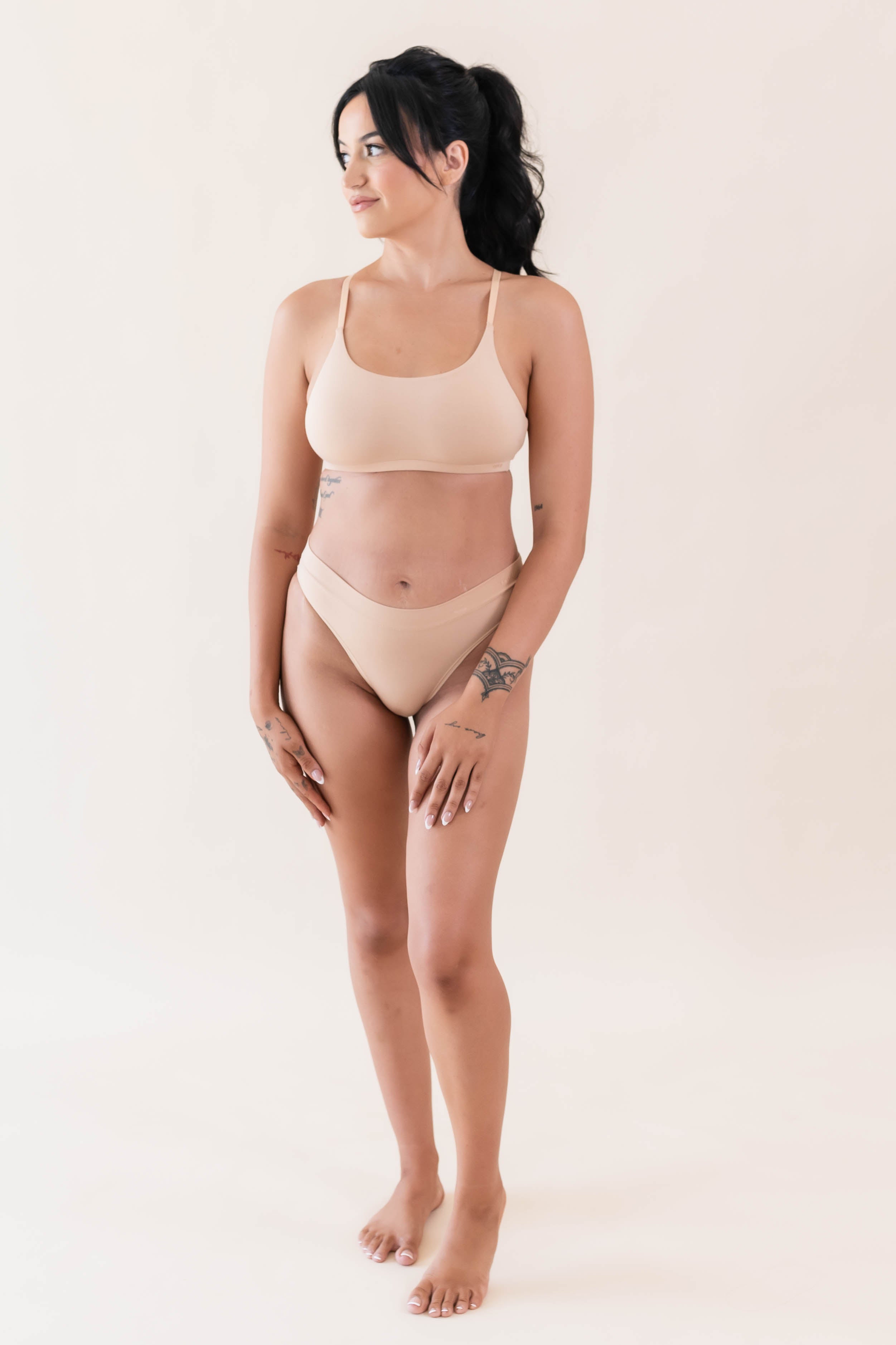 Model wearing Kyte Baby's Women's Scoop Neck Bralette in Chai