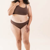 Model wearing the Kyte Baby's Women's Scoop Neck Bralette in Toffee