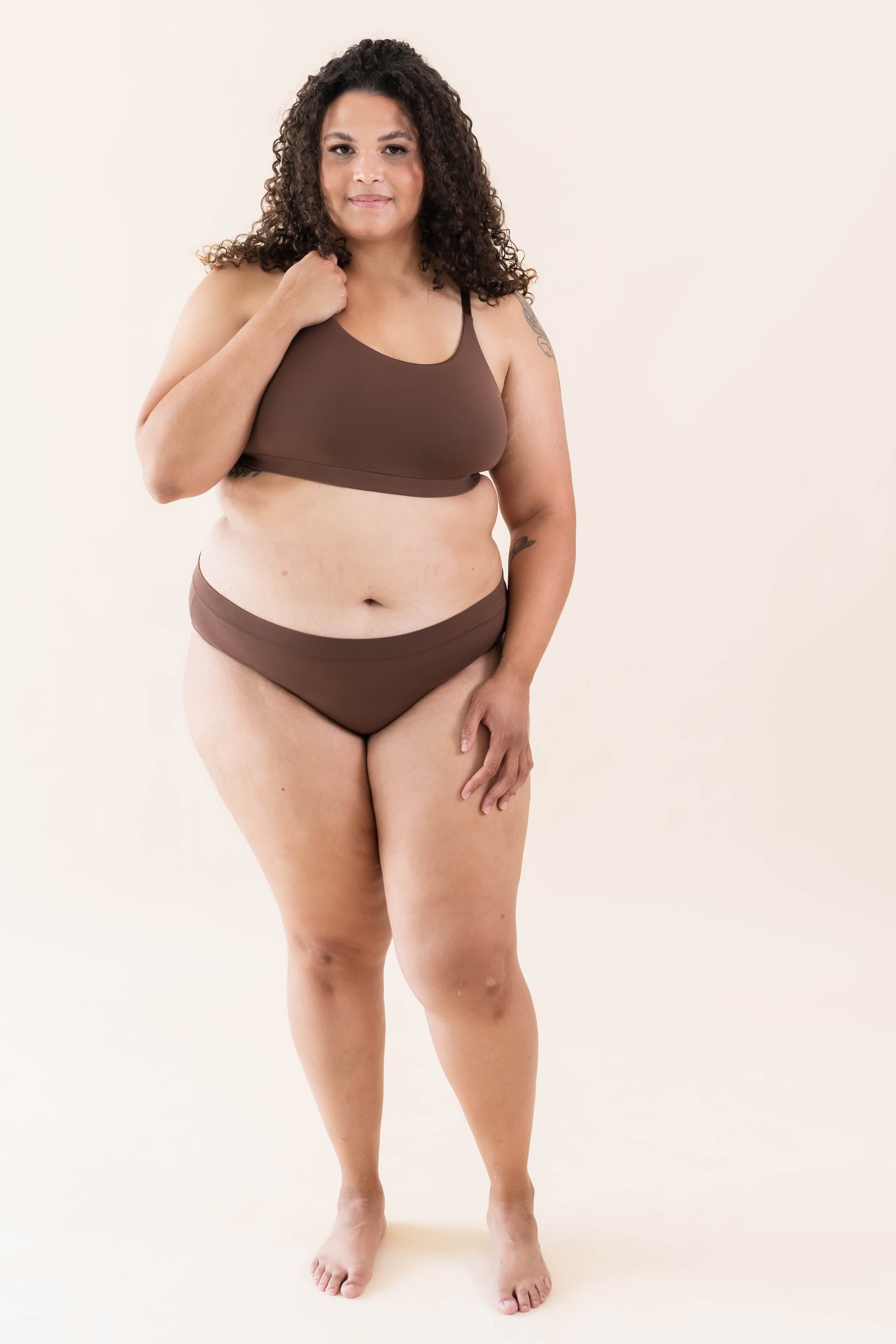 Model wearing the Kyte Baby's Women's Scoop Neck Bralette in Toffee