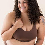Model wearing the Kyte Baby's Women's Scoop Neck Bralette in Toffee