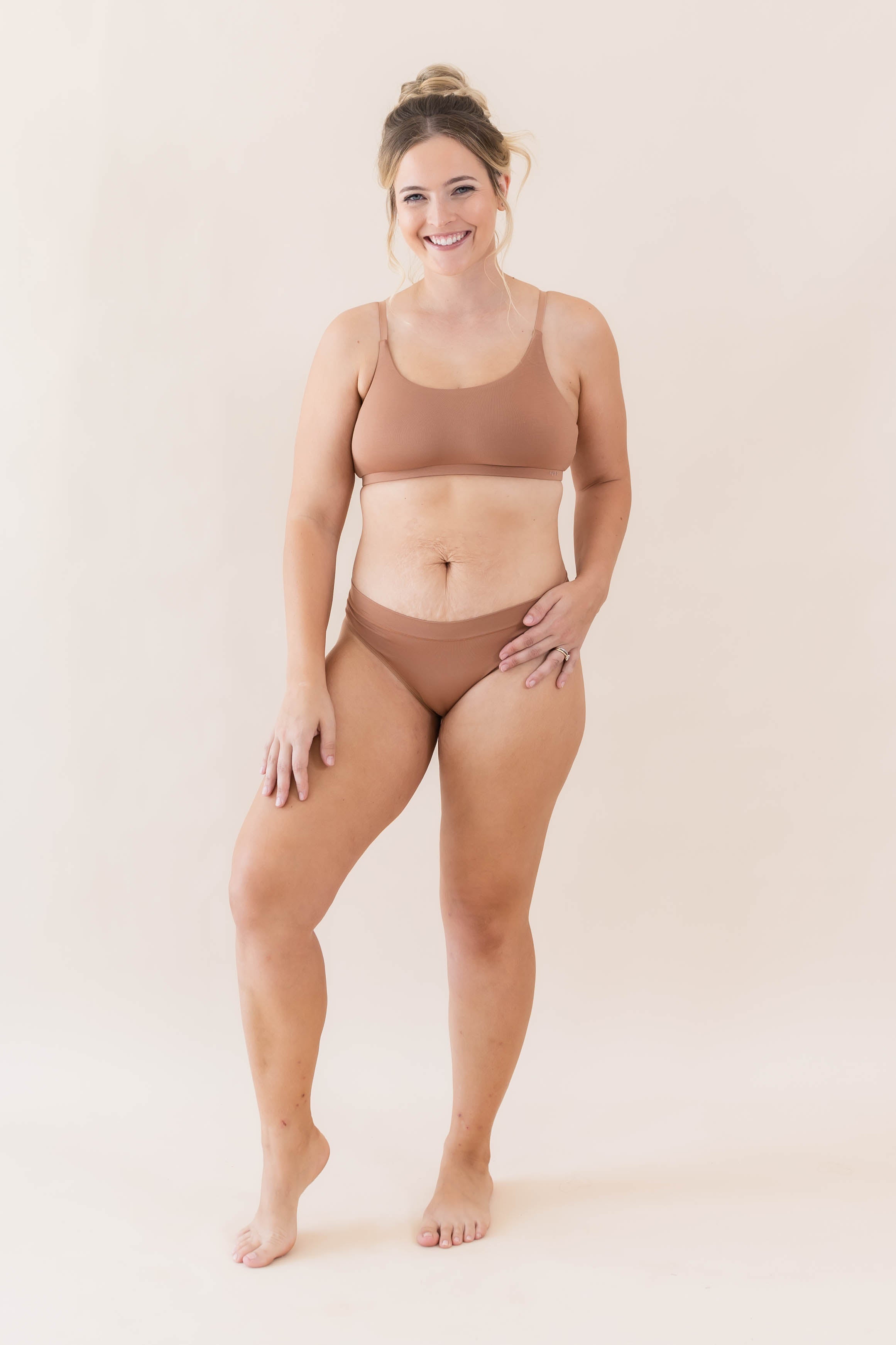 Model wearing Kyte Baby's Women's Scoop Neck Bralette in Latte