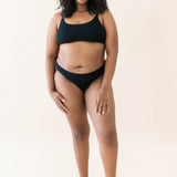 Model wearing the Kyte Baby's Women's Thong in Midnight