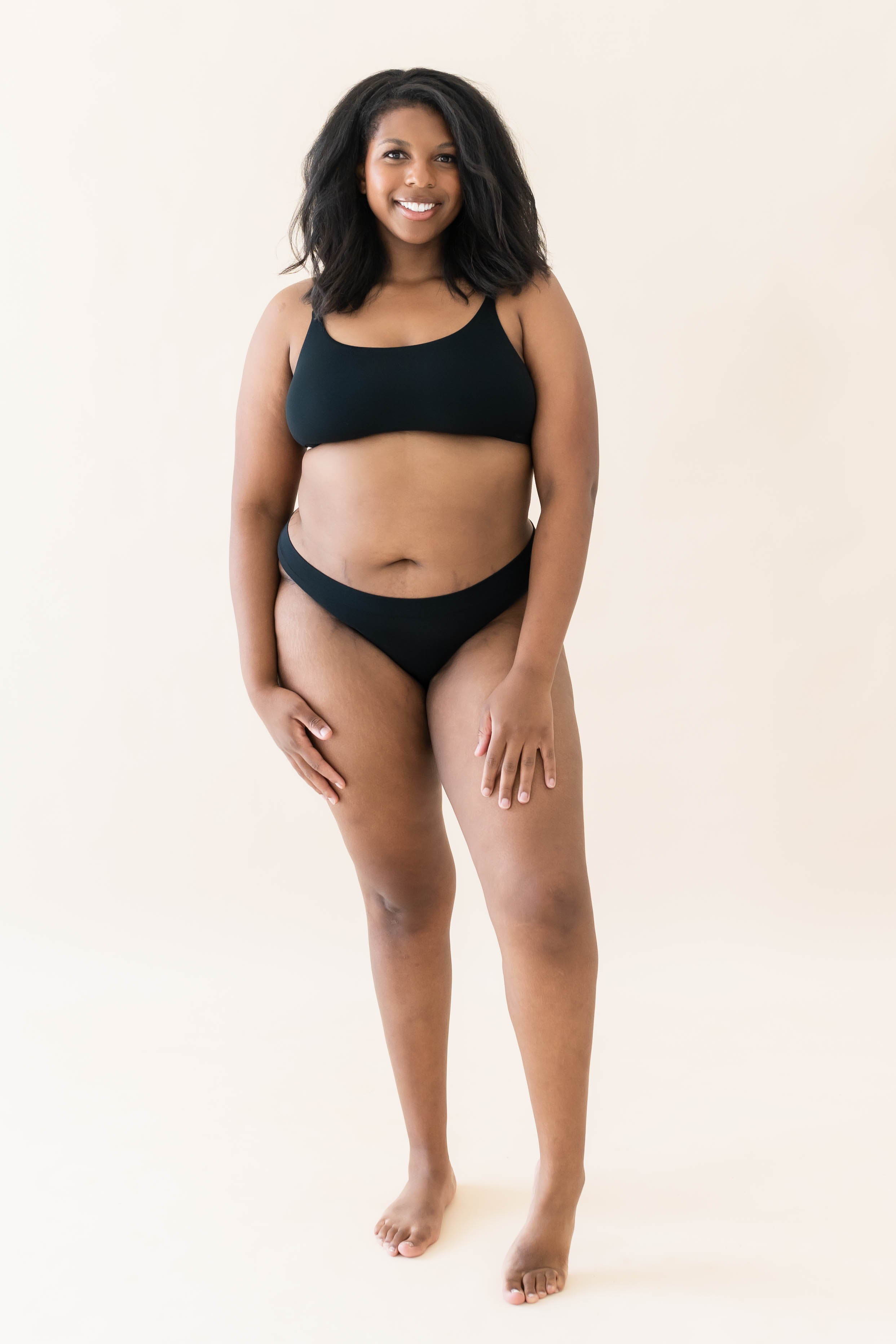 Model wearing the Kyte Baby's Women's Thong in Midnight