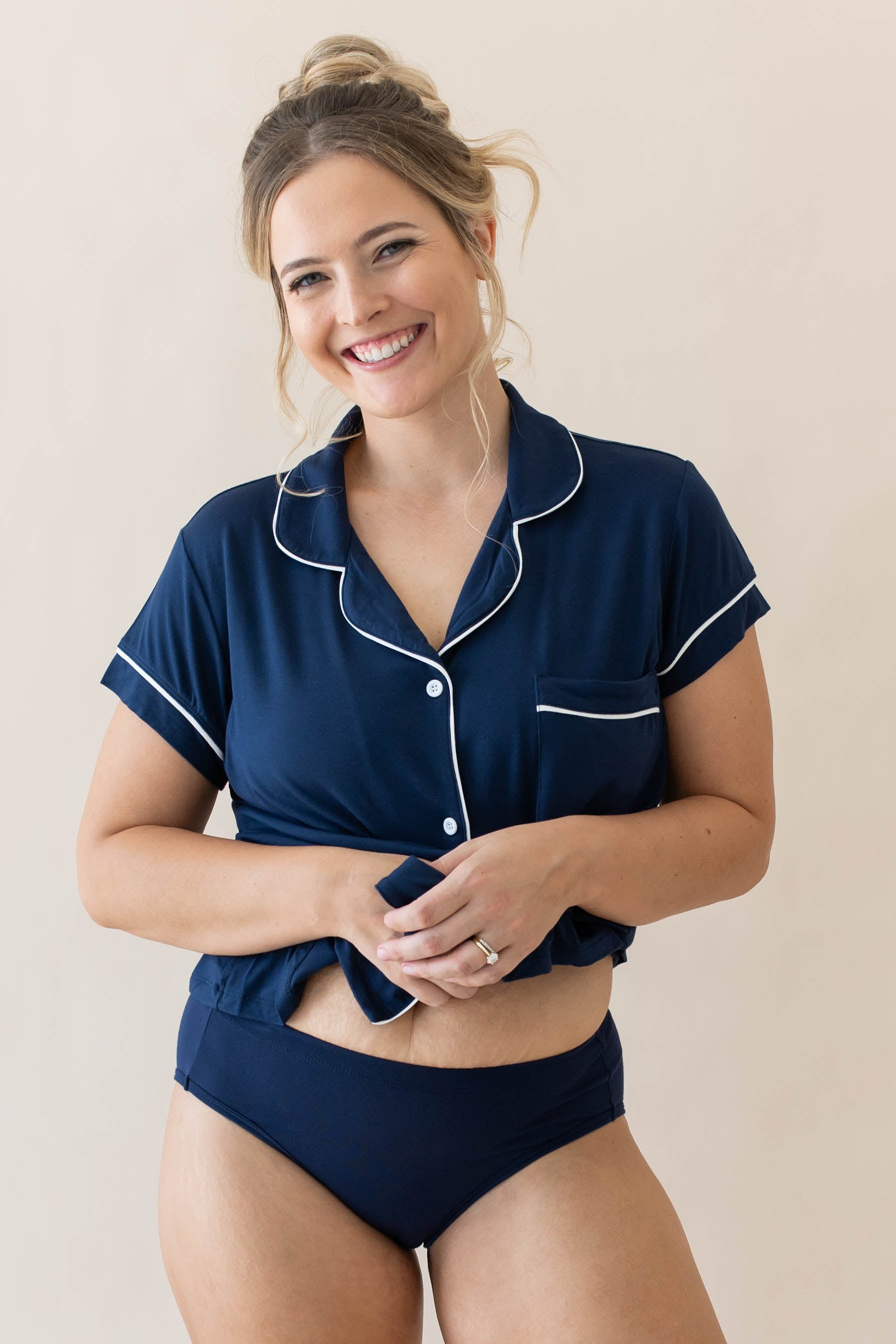 Female wearing Women's Short Sleeve Pajama Set in Navy with Cloud Trim Top paired with Navy Women's Underwear