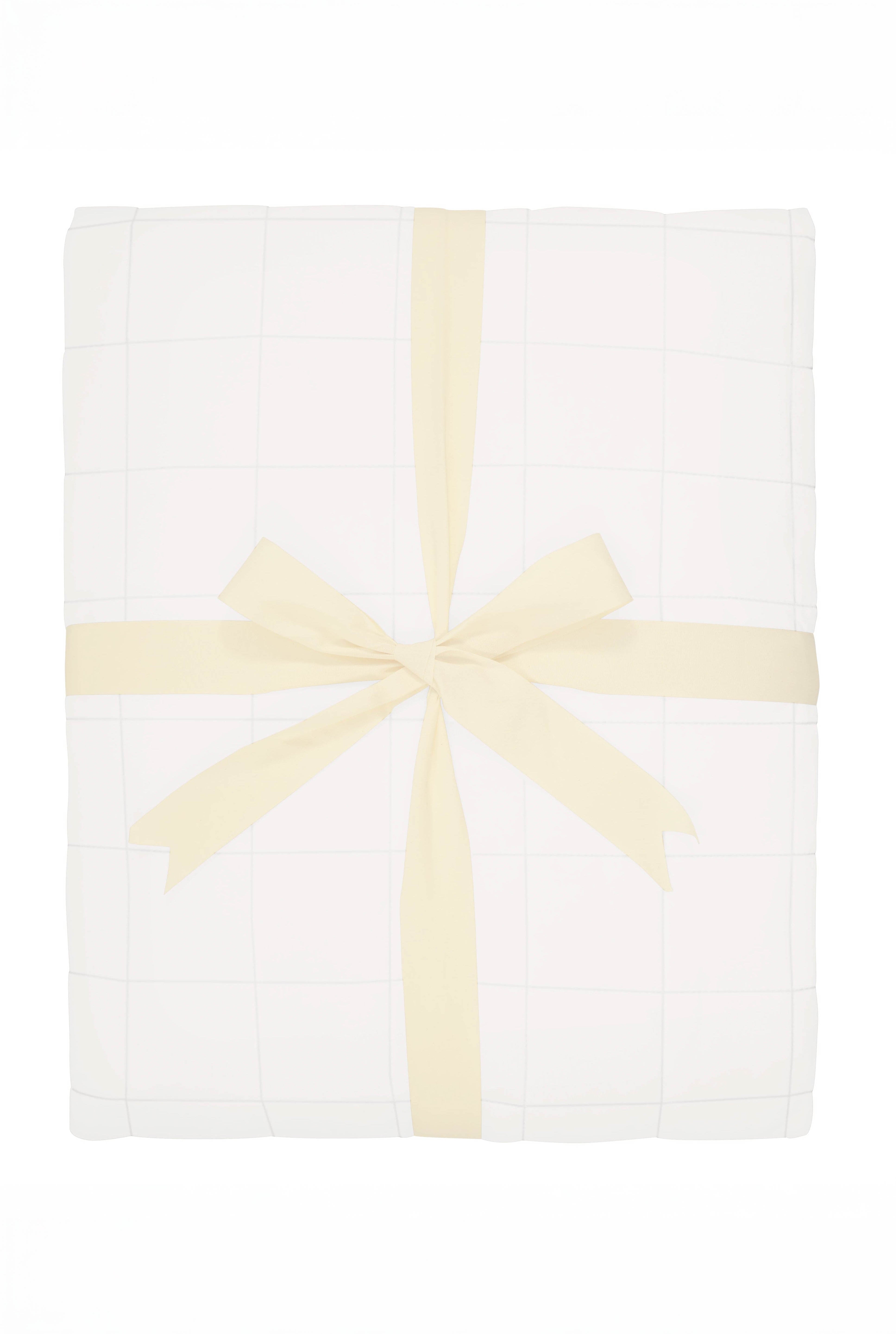 Kyte Baby's Adult Quilted Blanket in Cloud 2.5
