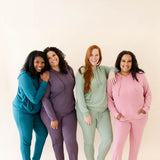 Four female models wearing various colors in the Women's Ribbed Jogger Pants