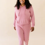 Female model in the Women's Ribbed Hoodie in Apple Blossom and Apple Blossom Jogger Pants
