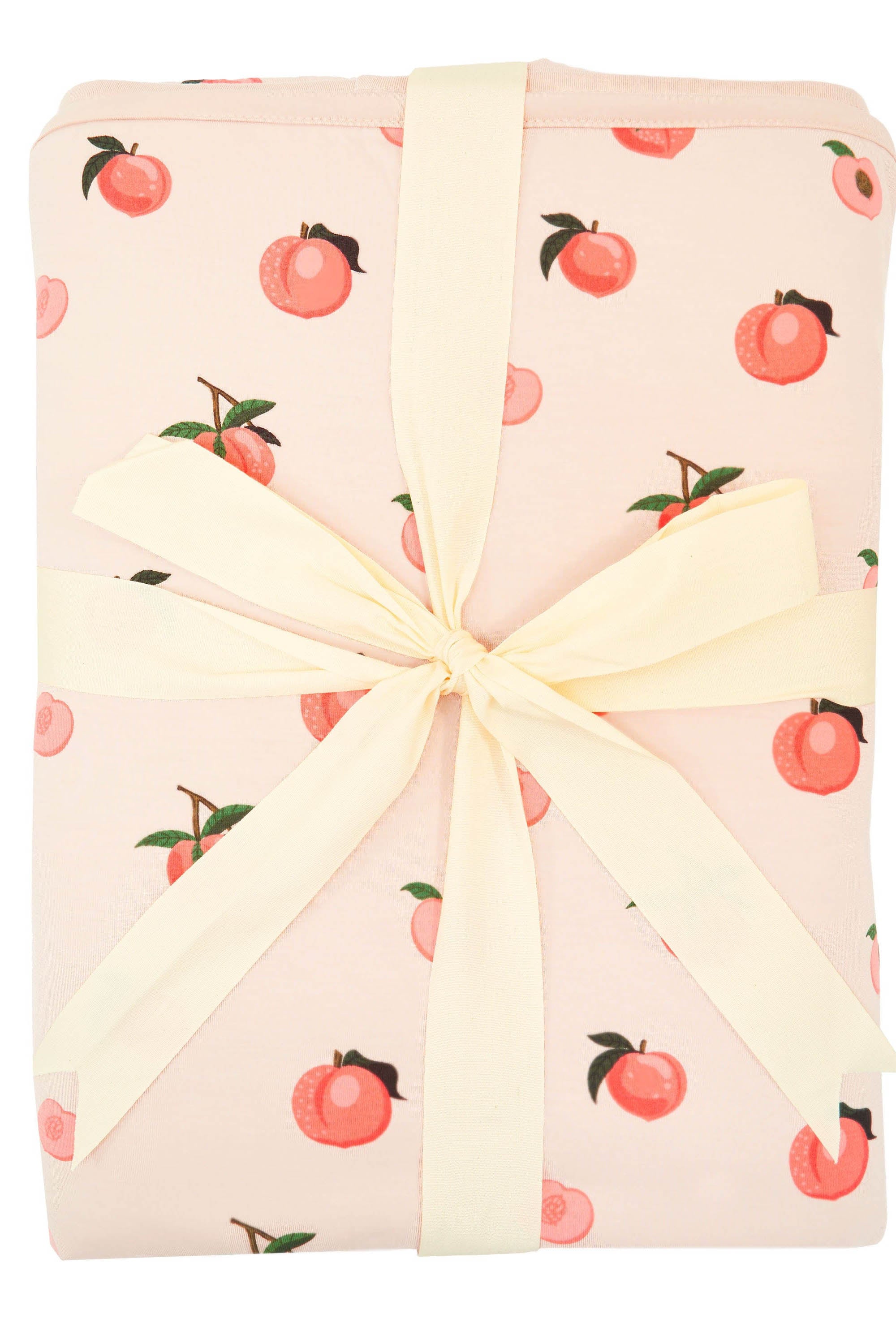 Kyte Baby's Throw Blanket in Peach 1.0