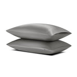 Two pillows with the Bamboo Sateen Pillowcase on them stacked on one another