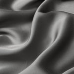 Close up of the bamboo sateen fabric: A warm charcoal grey