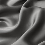 Close up of the bamboo sateen fabric: A warm charcoal grey
