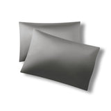 Two pillows one on top of the other with the Bamboo Sateen Pillowcases in Ash on them