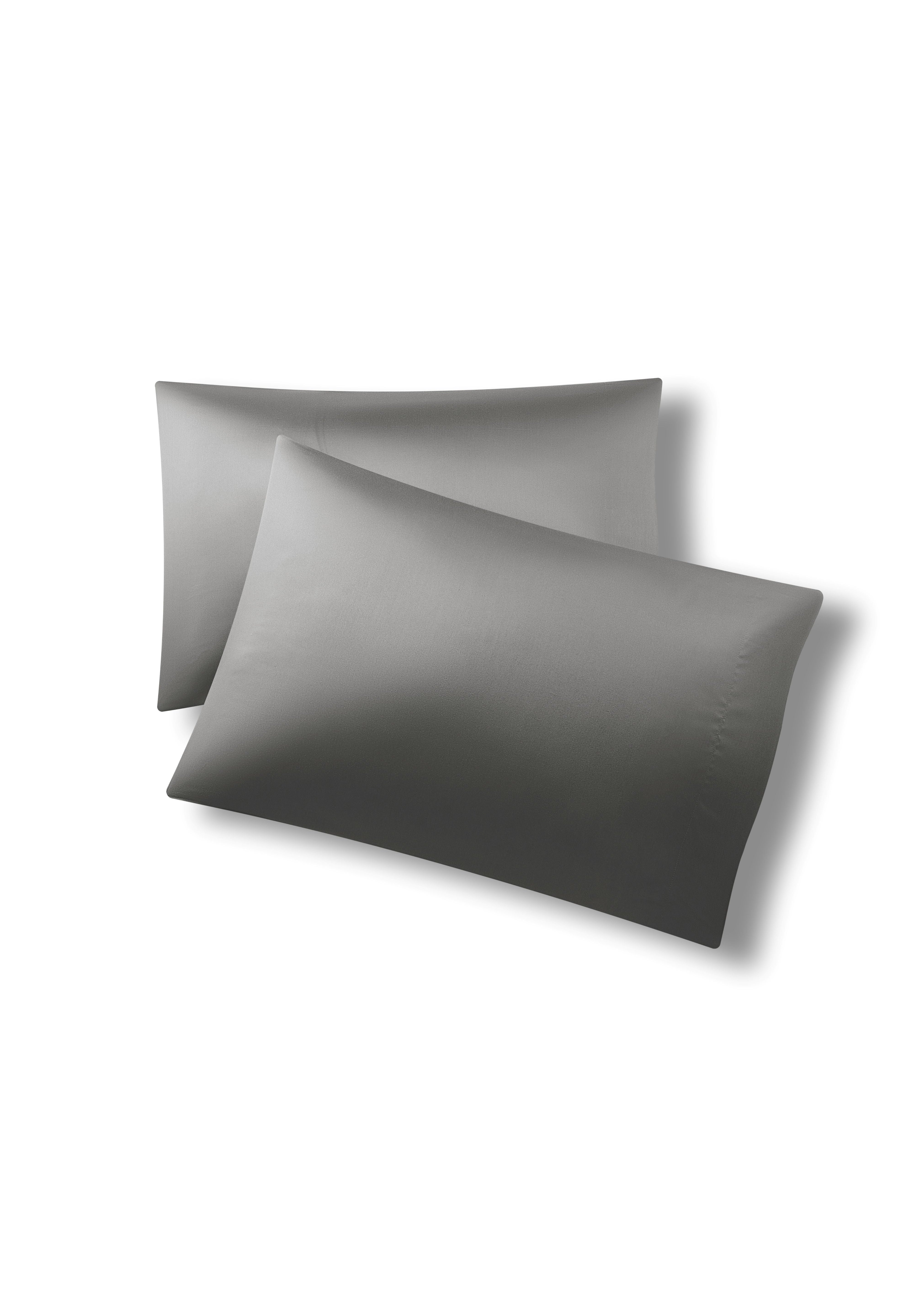 Two pillows one on top of the other with the Bamboo Sateen Pillowcases in Ash on them
