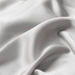 Close up of the bamboo sateen fabric: A warm grey