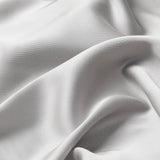 Close up of the bamboo sateen fabric: A warm grey