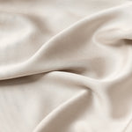 Close up of the bamboo sateen fabric: A dark beige