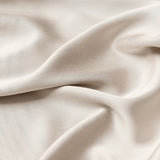 Close up of the bamboo sateen fabric: A dark beige