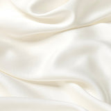 Close up of the bamboo sateen fabric: A soft off-white