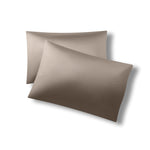 Two pillowcases on one another with the Bamboo Sateen Pillowcases in Truffle on them