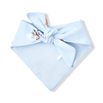 Blue fabric on the Back side of Dog Bandana in Holiday Pups print on a white background