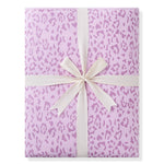 Adult Quilted Blanket in Thistle Leopard print packed in ribbon on white background