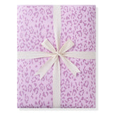 Adult Quilted Blanket in Thistle Leopard print packed in ribbon on white background