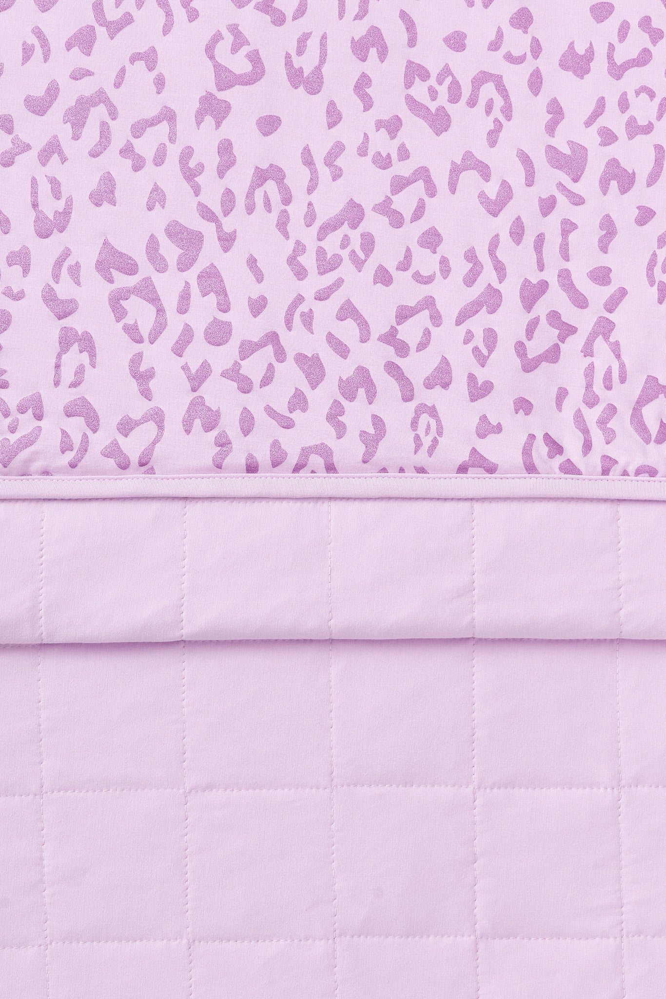 Front and back side of Adult Quilted Blanket in Thistle Leopard print