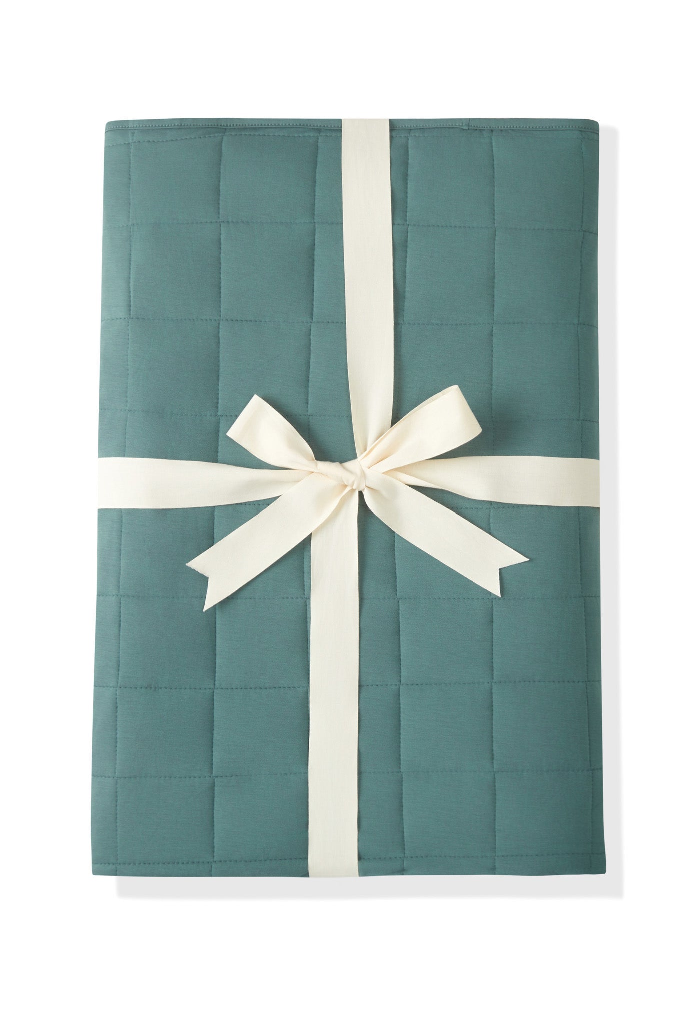 Adult Quilted Blanket in Pine 2.5 wrapped in a ribbon bow on a white background